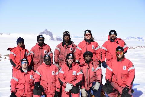 SANAE 57 (2018): Back (L-R) Elias Seabi (Senior Meteorological Technician), Lux Tanyana (Base Engineer), Sabelo Biyela (Diesel Mechanic), Cobus van der Merwe (Neutron Engineer), Hloni Rakoteli (Radio Technician); (front) Stephanus Schoeman (SANSA RADAR Engineer), Foster Mashele (SANSA VLF Engineer), Will Jelbert (Medical Doctor and Team Leader), John Skelete (Diesel Mechanic), Bo Orton (Electrician).